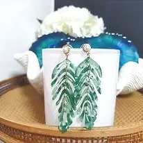 Pearl green feather drop earrings